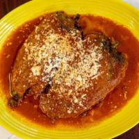 Chiles Rellenos · Two roasted poblano peppers filled with chicken, cheese or beef topped with our special red ...