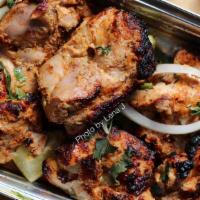 Chicken Behari · Succulent minced chicken tossed with fresh herbs with a tangy flavor off green chili and yog...