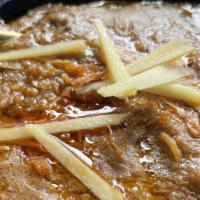 Quzy Haleem · A slow-cooked delicious stew of meat, lentils, and aromatic spices.