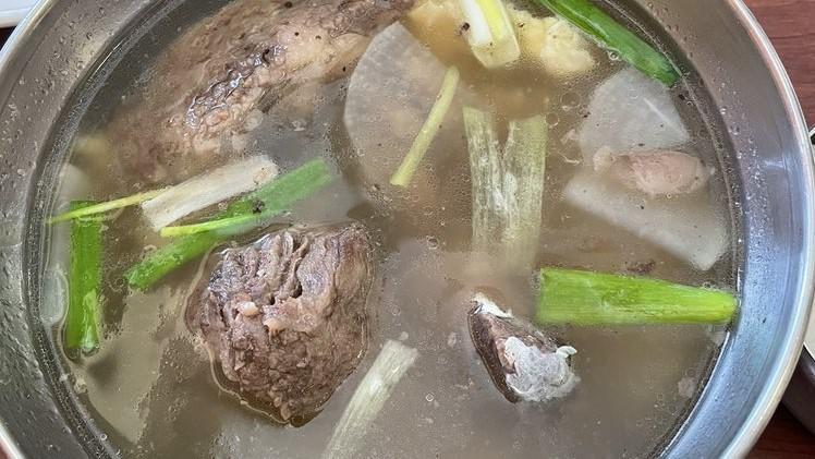 U Gujee Kalbitang · Tender short ribs and outer leaves of a cabbage in mild broth.