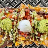 Xl Nachos · The extra large version of our Nachos. Great for sharing!