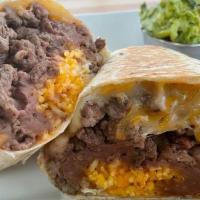 Steak Burrito · Steak, rice, beans and cheese stuffed in a flour tortilla. Served with a side of sour cream.