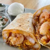 Shrimp Burrito · Grilled shrimp, rice, beans and cheese stuffed in a flour tortilla. Served with a side of so...