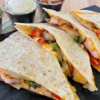Shrimp Quesadilla · Grilled shrimp, peppers, onions with melted cheese in a grilled flour tortilla. Served with ...