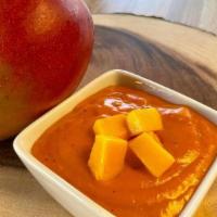 Mango Habanero Sauce · Sweet and flamin' hot, made with real mangos