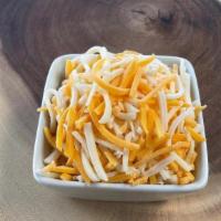 Shredded Mexican Cheese · Blend of shredded cheddar, monterey jack, asadero, and queso blanco