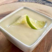 Baja Sauce · Our tangy, slightly sweet mayo based sauce, perfect for seafood tacos
