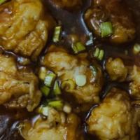 Gobi Manchurian · Fried cauliflower chopped in sweet, tangy & slightly spicy sauce, comes with rice.