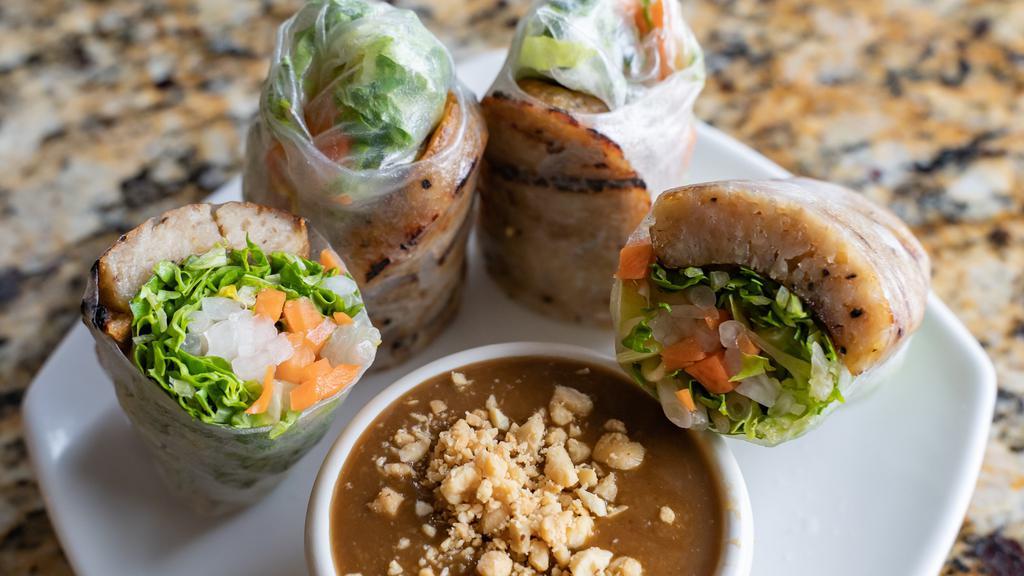 Grilled Pork Summer Rolls (2 Rolls) (Nem Nướng Cuốn) · Wrapped in rice paper served with peanut sauce.