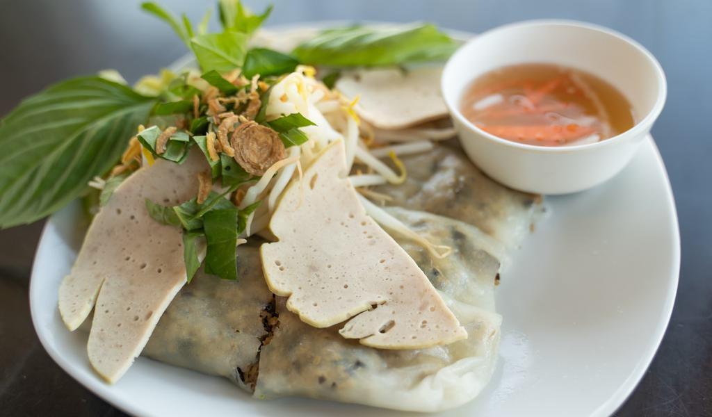 Vietnamese Steam Rice Rolls (Bánh Cuốn) · Pork mince, wood ear mushrooms, pork ham, shallots, basil and bean sprouts served with fish sauce.