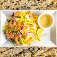 Mango Salad With Shrimp (Gỏi Xoài Sống Tôm) · Topped with fresh basis, onions, roasted peanuts and house vinaigrette sauce.