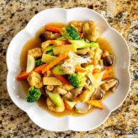 Sauteed Mixed Vegetables (Rau Xào Thập Cẩm Đặc Biệt) · Fried tofu, mushrooms, bamboo shoots, broccoli, carrots, celery, onions, garlics in a vegeta...