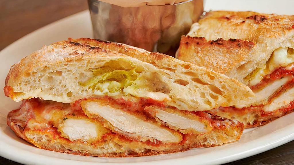 Chicken Parmesan Sandwich · Panko crusted chicken breast topped with house marinara and mozzarella cheese served on ciabatta bread.