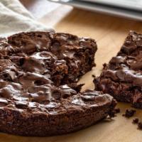 Mega Triple Chocolate Brownie · A rich, fudgy, amazingly delicious brownie made with ghirardelli� chocolate chips. big enoug...