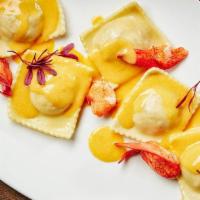 Homemade Lobster Ravioli · Spinach, lobster meat, and saffron cream.