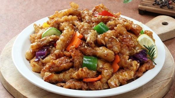 Tang Su Yook (탕수육) · Fried pork with sweet and sour sauce.