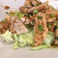 Yu Rin Gi (유린기) · Crispy fried chicken with hot, sour spicy lemon sauce and lettuce.