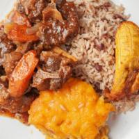 Oxtail · Served with rice and peas or white rice or provision.