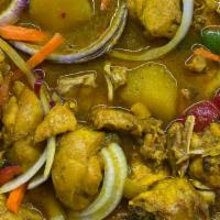 Curry Chicken · Served with rice and peas, white rice,.