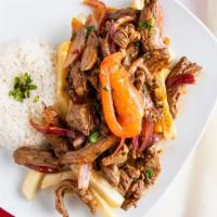 Lomo Saltado · Popular. Your choice of meat seasoned and sautéed with red onion and cilantro with steamed w...