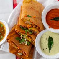 33 Spring Dosai · Vegetable roll filled with onions, tomato, cabbage, carrot, potatoes, peas and cauliflower w...