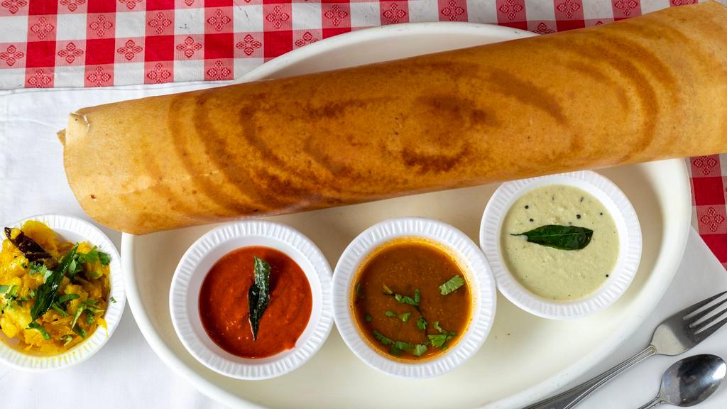 21 Masala Dosai · A crepe made of rice and lentils filled with potatoes and onions in mild spice.