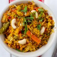 42 Vegetable Pulav · Rice cooked with garden fresh vegetables and flavored with spices and leaves.