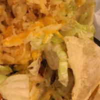 Burrito · Tortilla (12”) wrapped with rice, beans,
your choice of filling, lettuce, cheese,
then toppe...