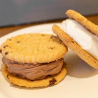 Chocolate Chip Ice Cream Sandwiches (6 Pack) · Creamy ice cream between two chocolate chip cookies. Three vanilla, three chocolate. (Contai...