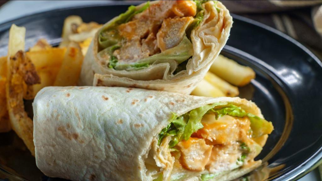 Buffalo Chicken Burrito · Delicious Burrito made with Two Eggs, Home Fries, Grilled Chicken, Buffalo Sauce Blue Cheese Dressing.