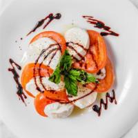 Caprese · Imported buffalo mozzarella
served with tomatoes, fresh
basil, our famous extra virgin
olive...