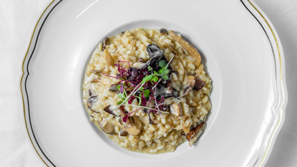 Funghi · Sautéed mix mushrooms,
shallots, parmesan cheese,
and white truffle oil