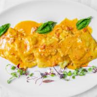 Cheese · Stuffed with ricotta parmesan
cheese in pink sauce