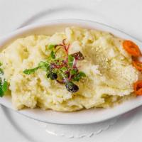 Mashed Potatoes · Creamy potatoes mixed with milk butter and seasoning.