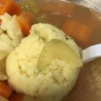 Matzo Ball Soup · Soup with dumplings.