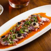 Grilled Baby Octopus  · Romesco sauce, baby arugula
