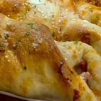 Chicken Roll · Strips of breaded chicken topped with tomato sauce and mozzarella.