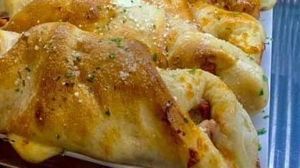 Chicken Roll · Strips of breaded chicken topped with tomato sauce and mozzarella.
