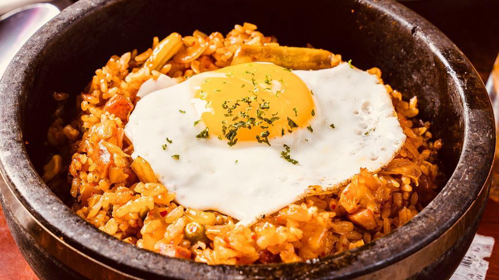 Kimchi Fried Rice · Pan-fried white rice with kimchi, sausage(pork), vegetable and. sunny side up egg (ADD MOZZARELLA CHEESE $2)