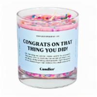 Congrats Candle · 1 piece. 9 oz candle.