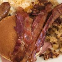 Hungry Man Special · Pancakes, two eggs, ham, bacon, sausage, home fries, and toast.
