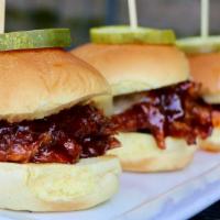Guinness Pulled Pork Sliders · Guinness BBQ sauce topped with melted Pepper Jack cheese.