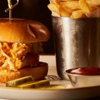Buffalo Chicken Sandwich · Buttermilk battered and tossed in buffalo sauce, melted NY Cheddar, and bleu cheese cole sla...