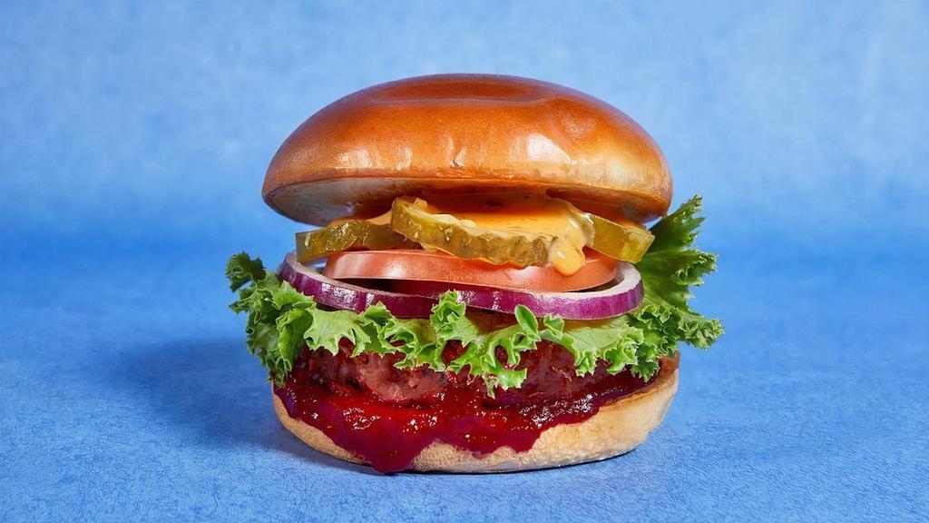 The Classic Burger · Your burger cravings answered with our take on the classic. Ingredients: Lentil and Pea Protein Patty, Lettuce, Tomato, Onion, Pickles, Beet Ketchup, Special Sauce, Potato Bun. . Contains: Gluten, Soy