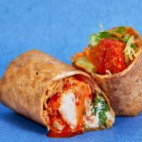 The Saucy Buffalo Wrap · Spicy, saucy cauli wrapped to perfection with some crunchy veggies. INGREDIENTS: Breaded Cau...