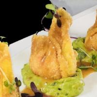 Spicy Tuna Gyoza 辣金枪鱼饺子 · Fried Spicy tuna wrapped with wonton skin served with Summer guacamole, sunset sauce.