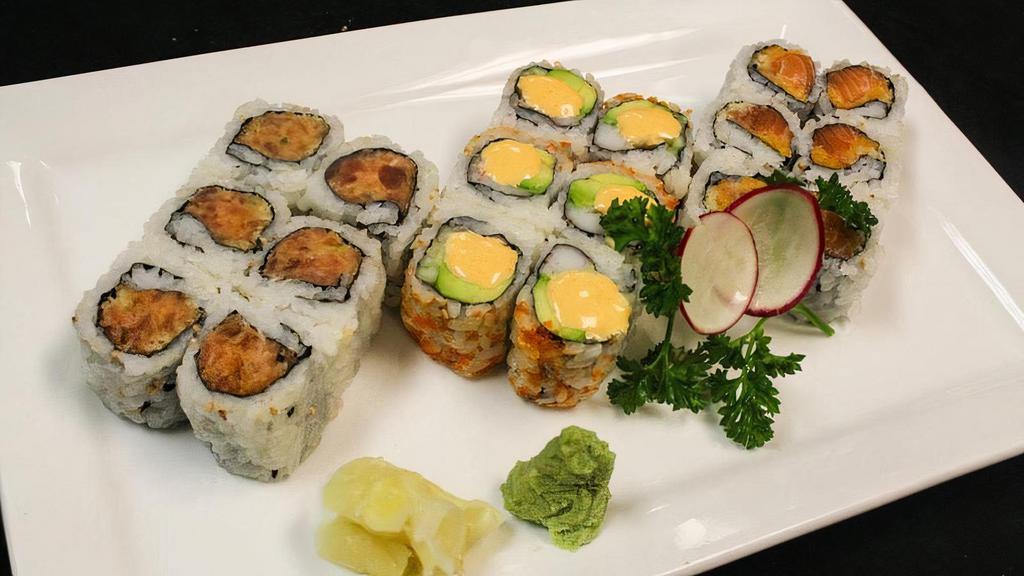Spicy Maki Combo · Spicy salmon, Spicy tuna and Spicy yellowtail roll. Served with miso soup or salad.