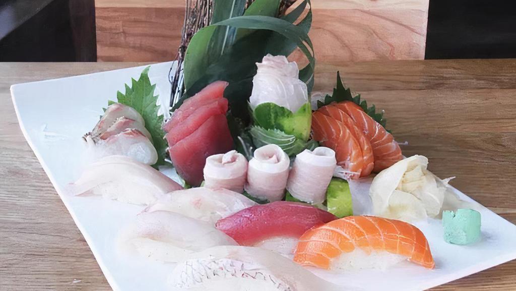 Sushi & Sashimi For 1 · 14pc assorted sashimi, 6pc sushi and 1 spicy salmon roll. Served with miso soup or salad.