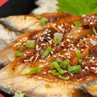 Unagi Don · Eel over rice. Served with miso soup.