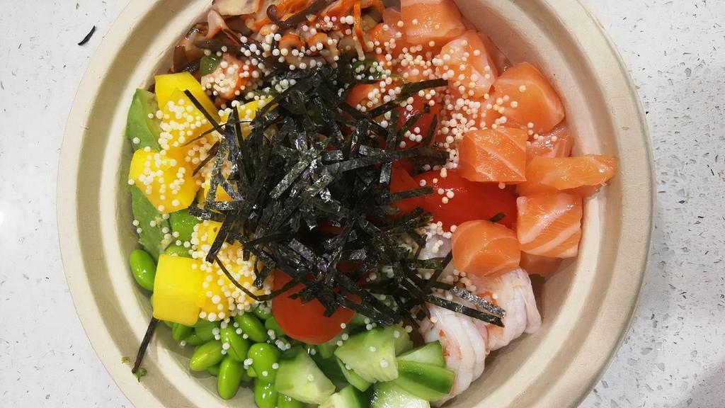 Ocean Bowl · Shrimp, Tako Salad, Salmon(raw), Avocado, Seaweed Salad, Tomato, Cucumber, Edamame and Mango with Citrus Miso Sauce,rice puff,roasted seaweed.